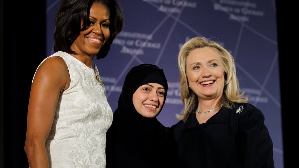 Samar Badawi receiving the 2012 International Women of Courage award from first lady Michelle Obama and  secretary of state Hillary Clinton. File photograph:  Gary Cameron/Reuters