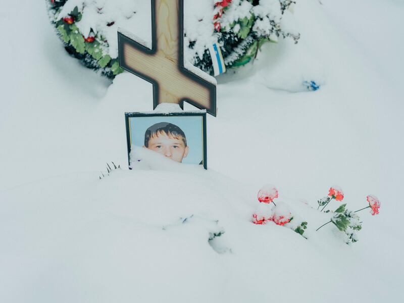 The snow-covered grave of a Russian soldier at the cemetery in Ryazan. Photograph: Nanna Heitmann/New York Times