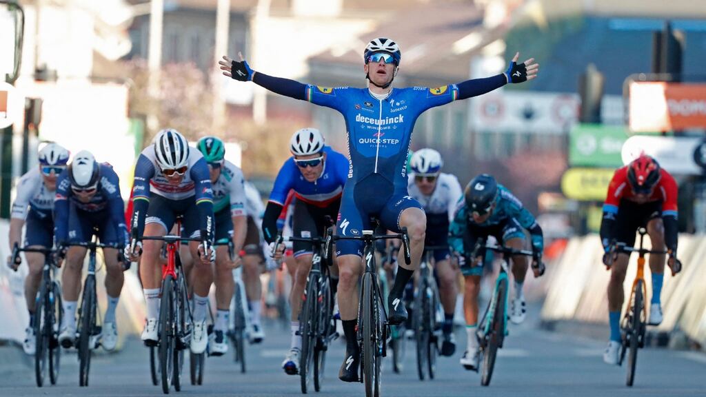 Team Deceuninck rider Ireland’s Sam Bennett celebrates as he crosses the finish line at the end of the first stage of the 79th Paris - Nice race between Saint-Cyr-lEcole and Saint-Cyr-lEcole. Photo: Bas Czerwinski/AFP via Getty Images