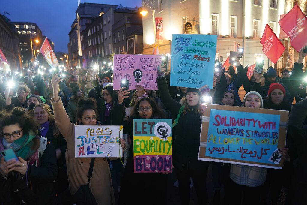 People in the centre of Dublin take part in a march to mark International Women's Day