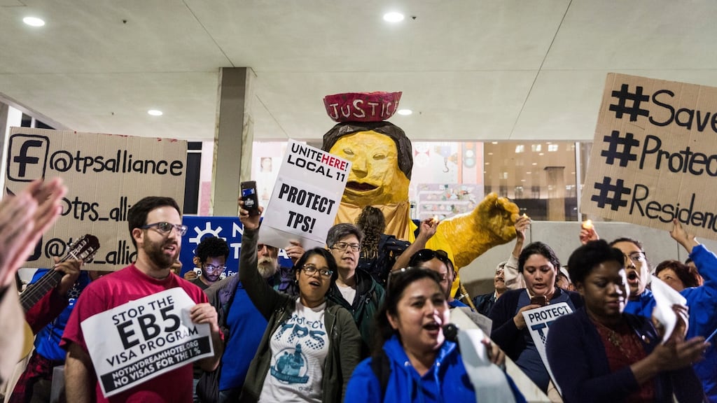 Supporters of the program that gives people from some countries temporary protection from deportation rally in Los Angeles. Photograph: Emily Berl/The New York Times)
