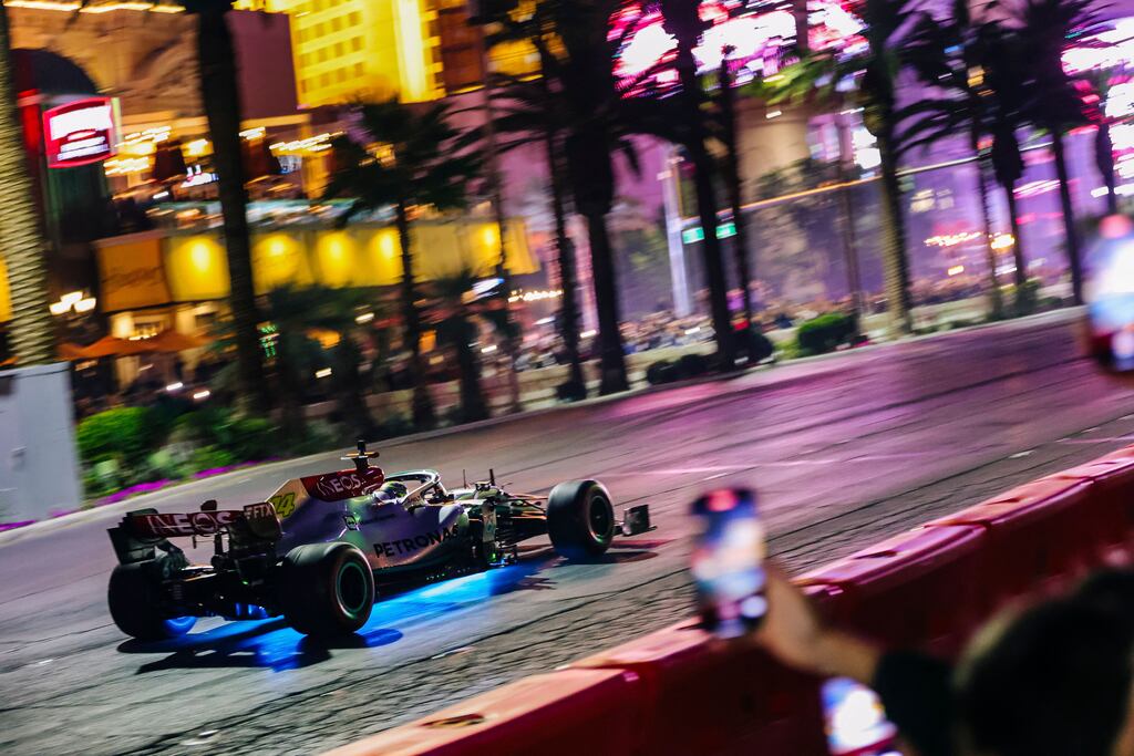 A Formula 1 racing team car from Mercedes-AMG Petronas makes a live run on the Las Vegas Strip. Photograph: Wade Vandervort/AFP via Getty