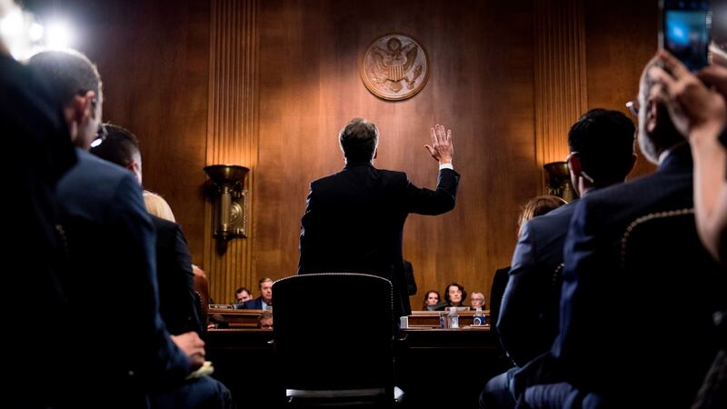 US Supreme Court nominee Judge Brett Kavanaugh is sworn in before testifying at the Senate Judiciary Committee on Capitol Hill in Washington, DC. Photograph: TOM WILLIAMS/AFP/Getty Images