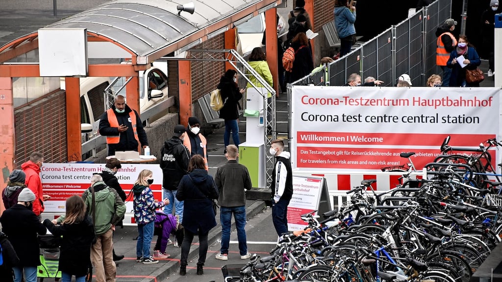 Pedestrians stand in line for Covid-19 coronavirus tests at a mobile test station at the main station in Cologne, Germany, October 15th 2020. Photograph: Sascha Steinbach/EPA