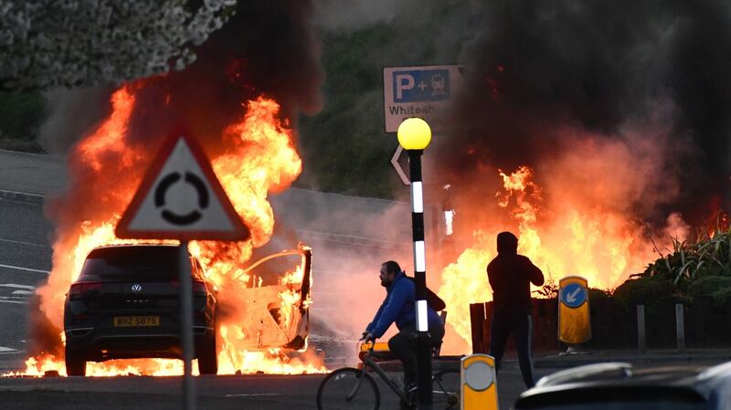 Petrol bombs and masonry were thrown at police during disturbances in Newtownabbey and Carrickfergus in Co Antrim on Sunday. Photograph: Photopress