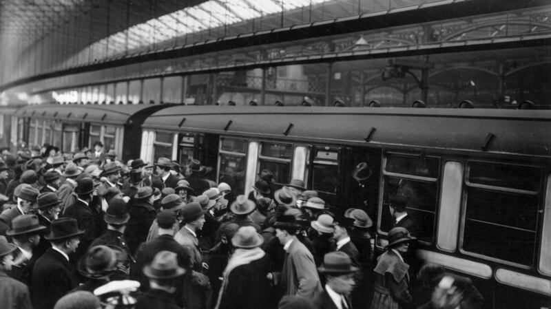 May 1923: Irish deportees boarding trains at London’s Waterloo station. They are being deported in connection with IRA activities. Photograph: Topical Press Agency/Getty Images