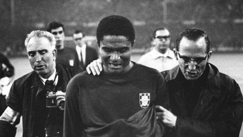 A file image of Eusebio leaving the pitch in tears after Portugal lost the 1966 World Cup semi final 2-1 to England. Photograph: Getty