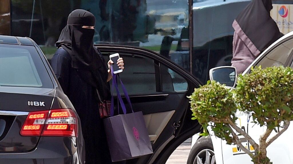 A Saudi woman outside a mall in the Saudi capital Riyadh a day after the government lifted a ban on women driving. Photograph: Fayez Nureldine/AFP/Getty Images