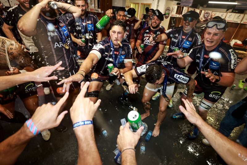 Bordeaux players celebrate in the dressing room after the game. Photograph: Dan Sheridan/Inpho