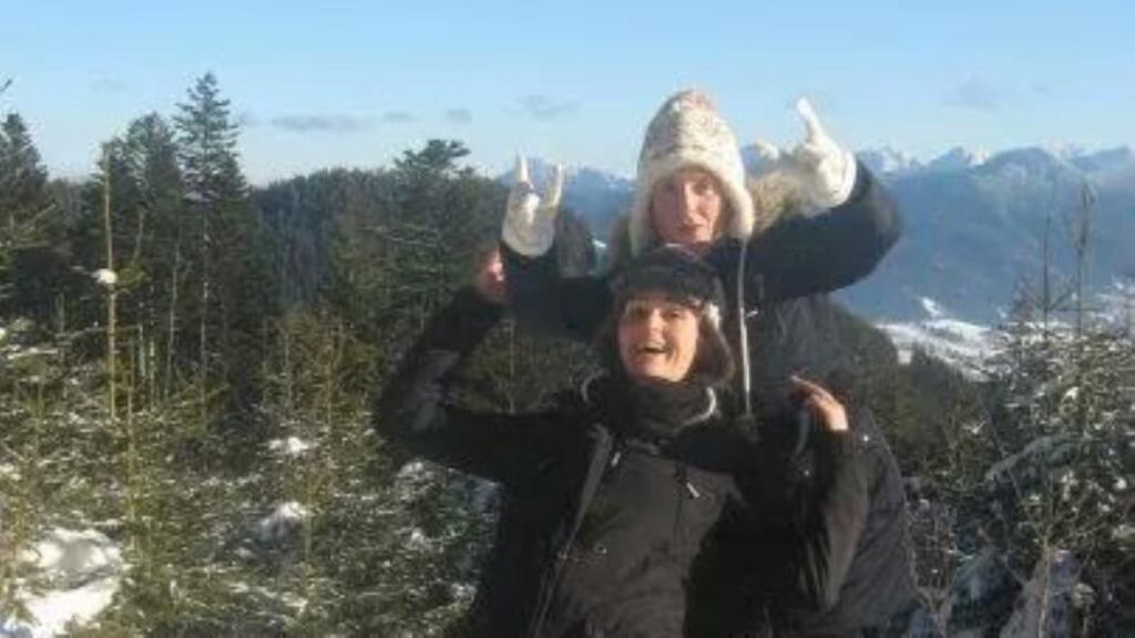 Ann Murphy with her friend Franka on a sledding trip. ‘Secretly you find yourself starting to miss the rain, the ham sandwiches, the Club Orange and everything you once loftily declared provincial. The rules and regulations are driving you mad. And they talk on the phone about flooding, factories closing, water charges... and it all sounds blissful.’