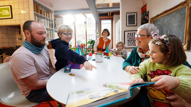 Ann Ingle at home with her daughter Katie Ingle, Katie’s husband Killian Holmes and their three children Síofra (9), Iseult (7) and Mícheál (3). Photograph: Alan Betson