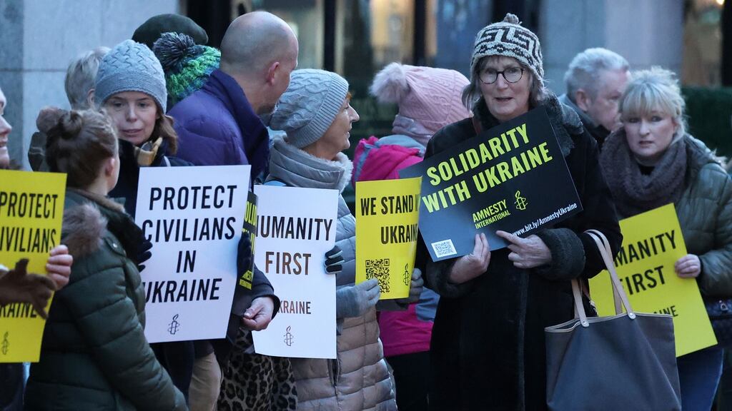 Amnesty supporters hold a vigil to show solidarity with the people of Ukraine in Dublin city centre on Thursday evening. Photograph: Nick Bradshaw