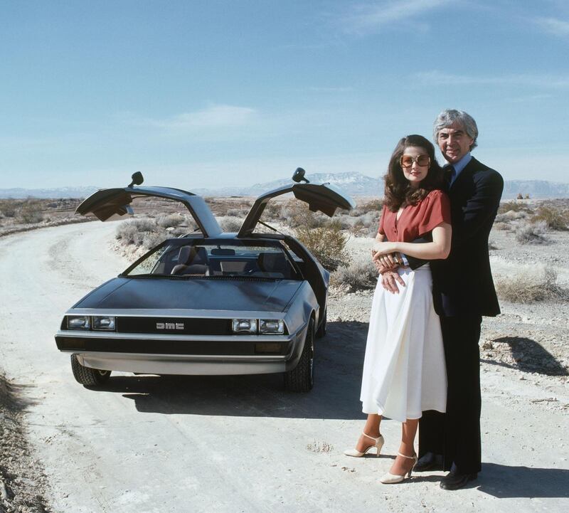 John DeLorean and his wife, Cristina Ferrare, with one of his gull-wing cars. Photograph: Tony Korody/Sygma via Getty