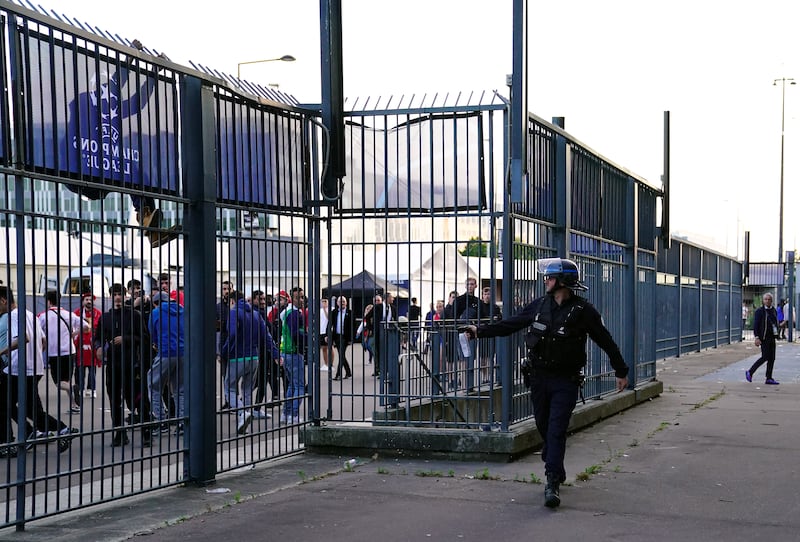 Police use pepper spray against fans outside the ground as the kick-off is delayed ahead of the Champions League final at the Stade de France. Photograph: Adam Davy/PA Wire