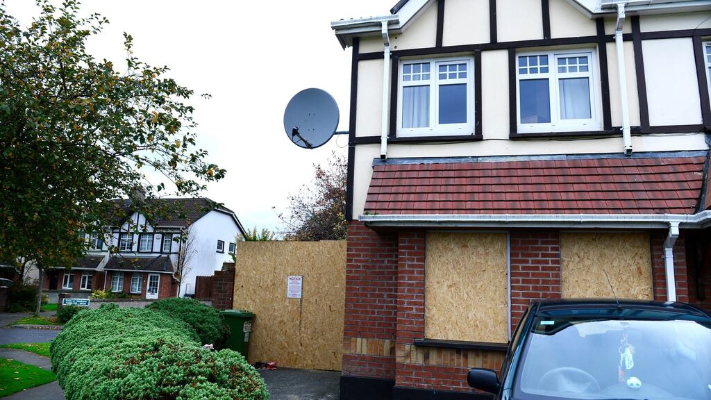 Tatiana Perju had been given notice by landlord Peter Wilson to quit a house (boarded up, above) at Saddlers Avenue, Mulhuddart, Dublin 15. He has been directed to allow them back into the property. Photograph: Cyril Byrne/The Irish Times