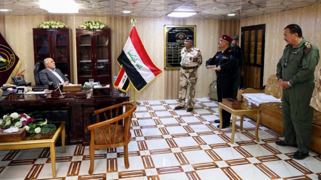 Iraq’s Prime Minister Haider al-Abadi, meets with his military commanders at an Iraqi Army base near the oil refinery town of Beiji north of Baghdad, Iraq. Photograph: AP Photo