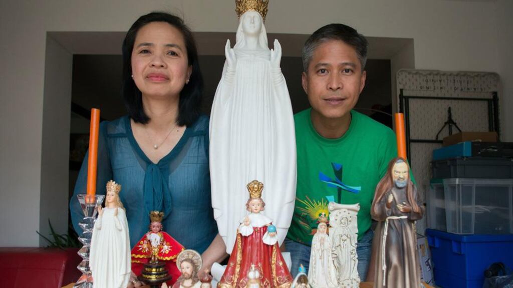 Lorna and Marlou Patindol, from the Philippines: hope the papal visit can draw people back into the Catholic Church. Photograph: Dave Meehan