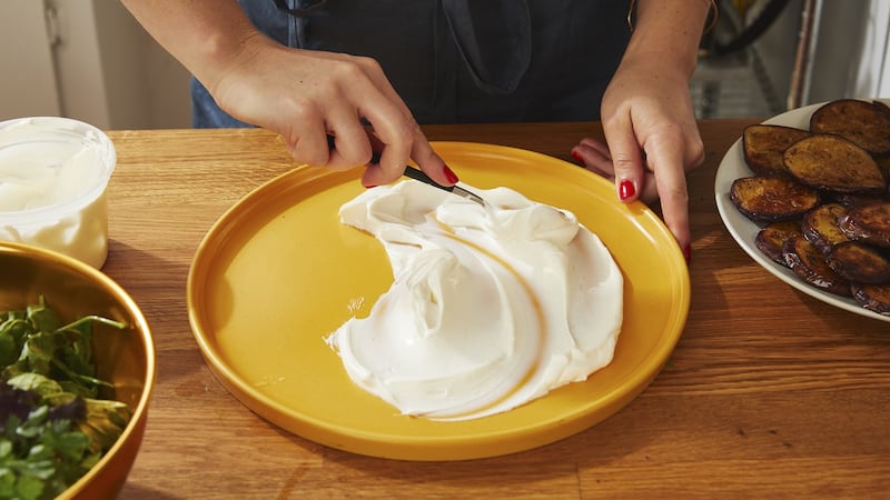 A sauce made of seasoned yogurt is made to sit below (not over) the meatballs. Photograph: Michael Graydon and Nikole Herriott/The New York Times