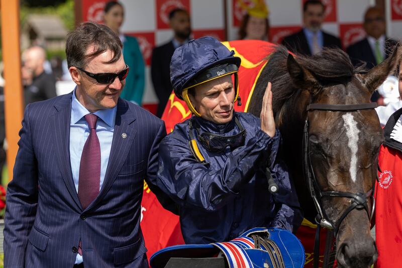 Aidan O’Brien and Ryan Moore with Lambourn after victory in The Dubai Duty Free Irish Derby. Photograph: Morgan Treacy/Inpho