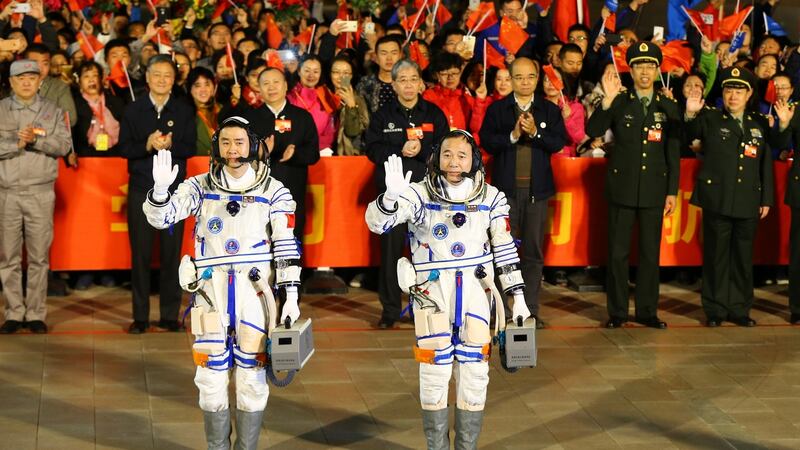Chinese astronauts Chen Dong and Jing Haipeng and during a ceremony prior to launching Shenzhou 11 manned spacecraft in Jiuquan, China. Photograph Li Jin/VCG/Getty Images