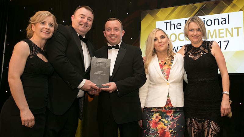 Angelyn Rowan, Partner Construction & Projects, Eversheds Sutherland presents the Excellence in the Procurement of Facilities Management award to the RCSI team