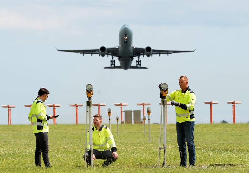 Dublin Airport: airfield facilities manager David Toolan, airfield delivery manager Odhran McCann and airfield electrical supervisor Sean Mackessy. Photograph: Dara Mac Dónaill