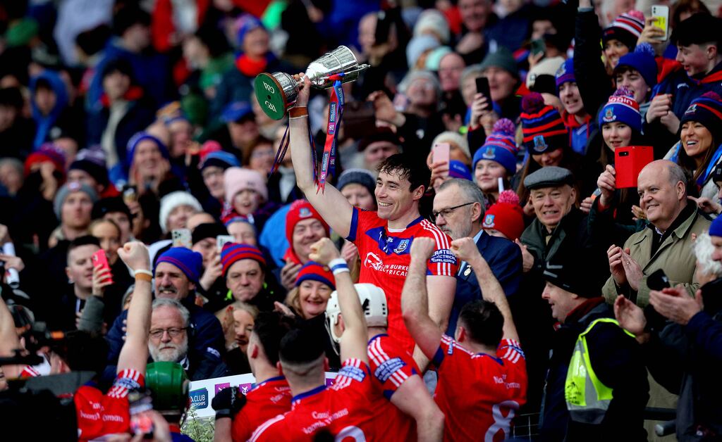 St. Thomas’ Conor Cooney lifts the trophy after the Galway side's victory over O'Loughlin Gaels in the AIB All-Ireland Club SHC Final at Croke Park. Photograph: Ryan Byrne/Inpho