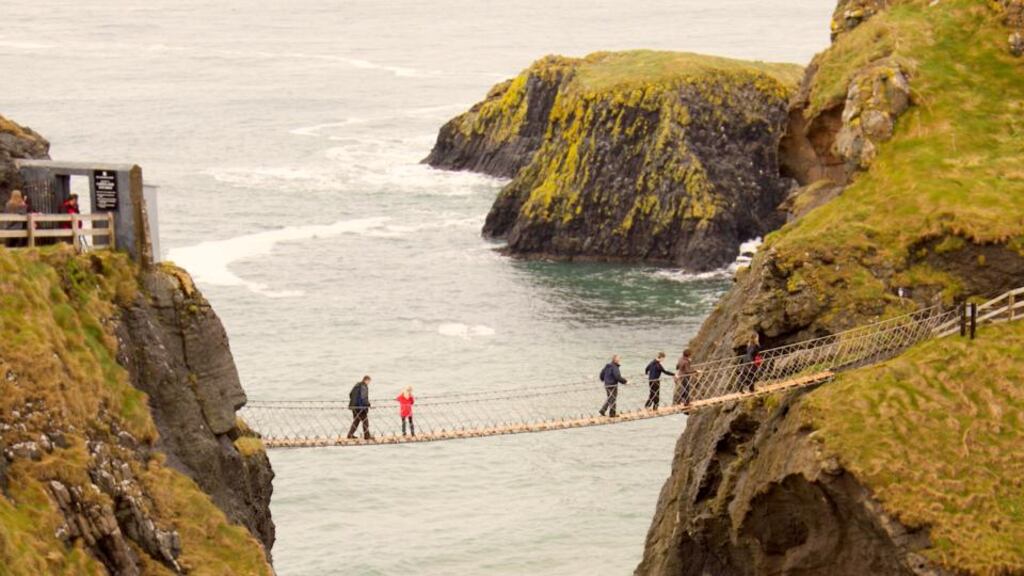 Swinging in the wind: Carrick-a-Rede rope bridge in Co Antrim. Photograph: iStock