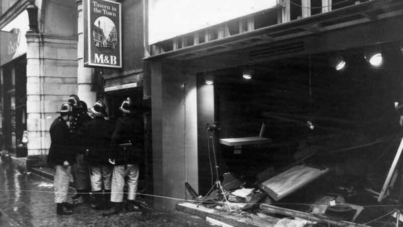 Firemen survey the damage outside the Tavern in the Town pub in Birmingham on November 22nd, 1974, following an IRA bomb blast. Two bombs exploded; the first in Mulberry Bush at 8.17pm and the second in the Tavern 10 minutes later. Photograph: Wesley/Keystone/Getty Images