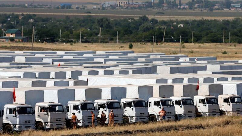 A Russian convoy of trucks carrying humanitarian aid for Ukraine is parked at a camp near Kamensk-Shakhtinsky, Rostov region. Photograph: Maxim Shemetov /Reuters
