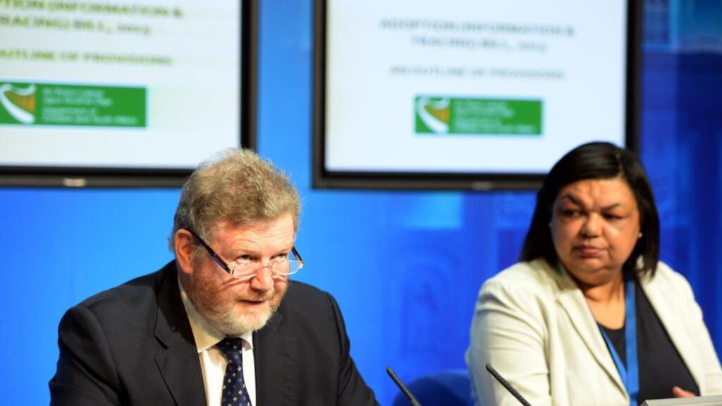 Minister for Children and Youth Affairs Dr James Reilly and Michelle Shannon, director of the Department of Children and Youth Affairs, at Government Buildings. Photograph: Eric Luke/The Irish Times