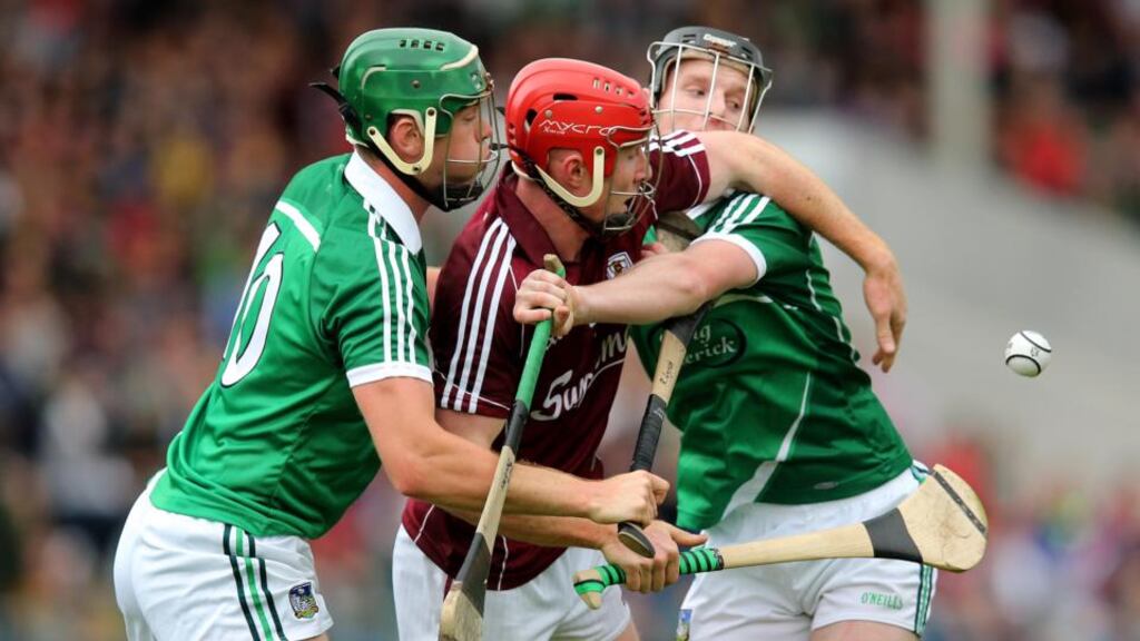Ronan Lynch and Cian Lynch with Sean Sweeney in the Under-21 All-Ireland hurling semi-final. Photograph: Inpho