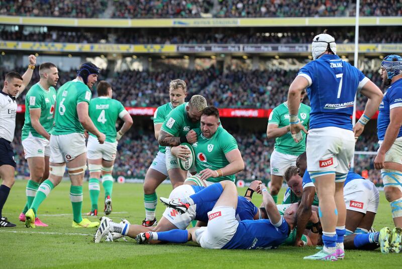 Jack Conan celebrates after scoring Ireland's third try during the Six Nations match against Italy at the Aviva Stadium. Photograph: Paul Faith/AFP via Getty Images