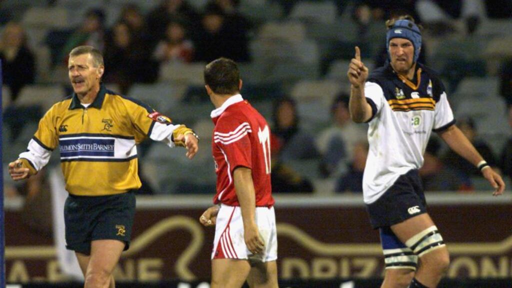 Justin Harrison clashes with the Lions’ Austin Healey in 2001. A fired-up Harrison would go on to make a lineout steal that decided the series. Photograph: Getty