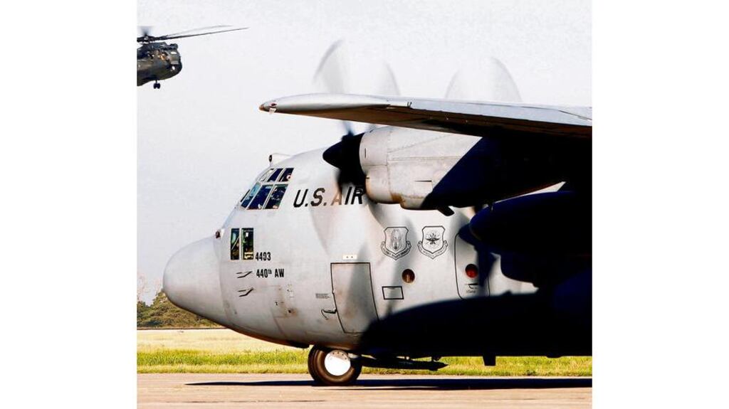A US aircraft with a cargo of humanitarian aid landing at the Toussant Louverture airport in Port-au-Prince, Haiti, yesterday. Many others had to circle for up to two hours.