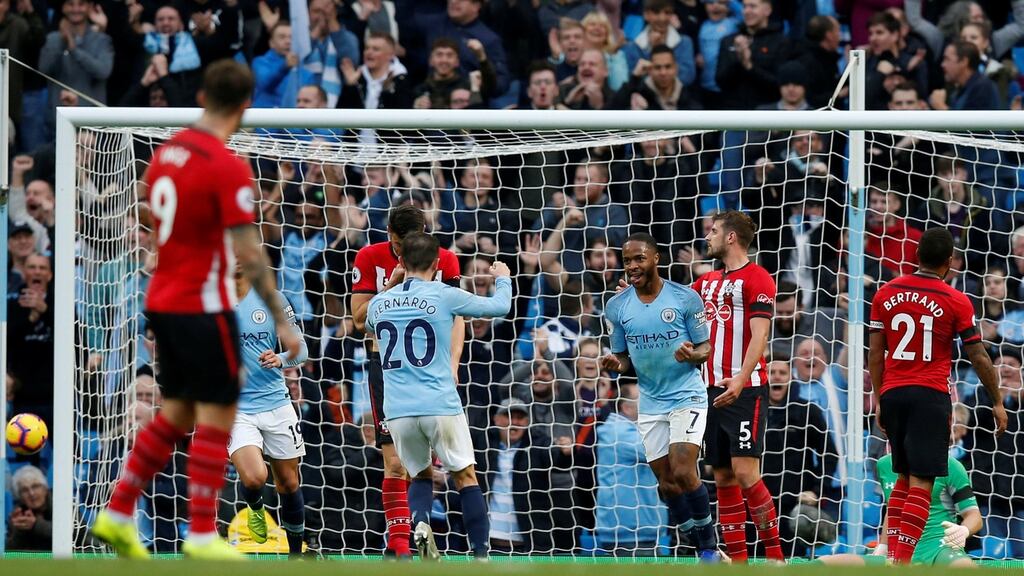 Manchester City’s Raheem Sterling celebrates scoring their fourth goal with team mates during the Premier League win over Southampton at the Etihad Stadium. Photo: Andrew Yates/Reuters