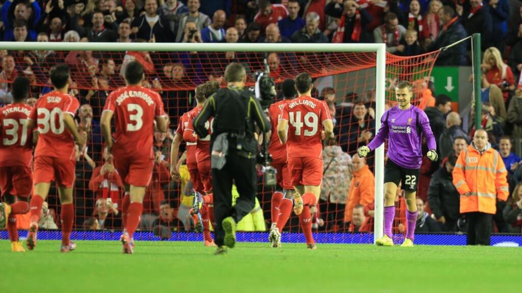 Liverpool’s Simon Mignolet celebrates their win after a marathon penalty shoot-out during the League Cup third round match at Anfield.