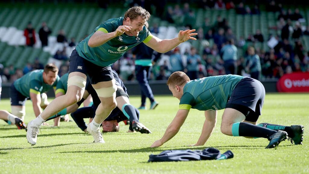 Jamie Heaslip and Paddy Jackson during open training at the Aviva Stadium on Monday. Photograph: INPHO/Dan Sheridan