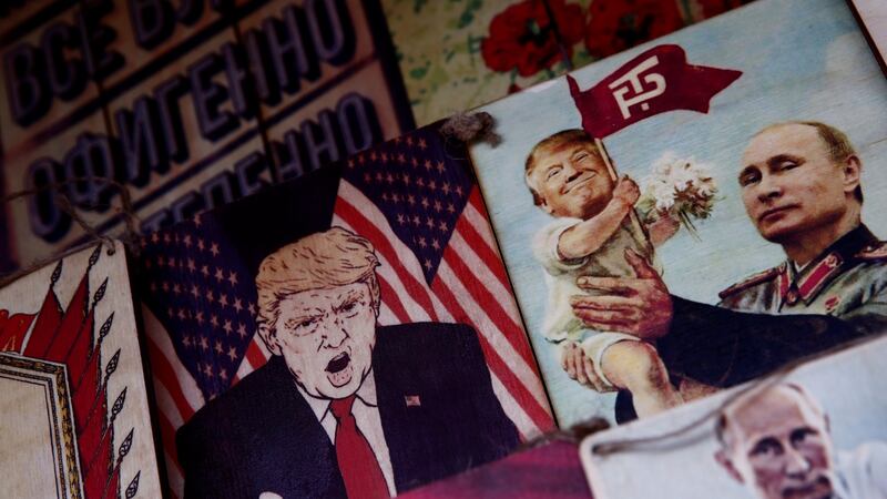 Pictures depicting Russian president Vladimir Putin and US president Donald Trump on sale at Izmailovsky Market in Moscow. Photograph: Christian Hartmann/Reuters