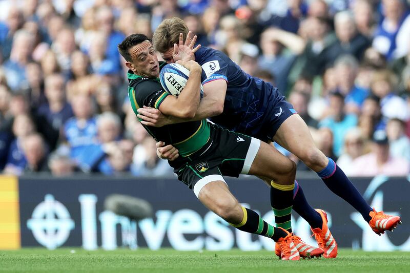 Northampton Saints' Alex Mitchell is tackled by Jordie Barrett of Leinster - Barrett was introduced to the game in the 50th minute. Photograph: Laszlo Geczo/Inpho
