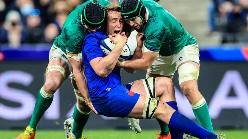 France’s Anthony Jelonch is tackled by James Ryan and Caelan Doris of Ireland during the Six Nations clash at the Stade de France. Photograph: Billy Stickland/Inpho