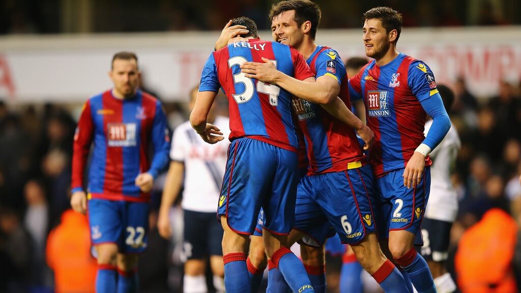Martin Kelly of Crystal Palace is congratulated after scoring at White Hart Lane. Photograph: Richard Heathcote/Getty Images
