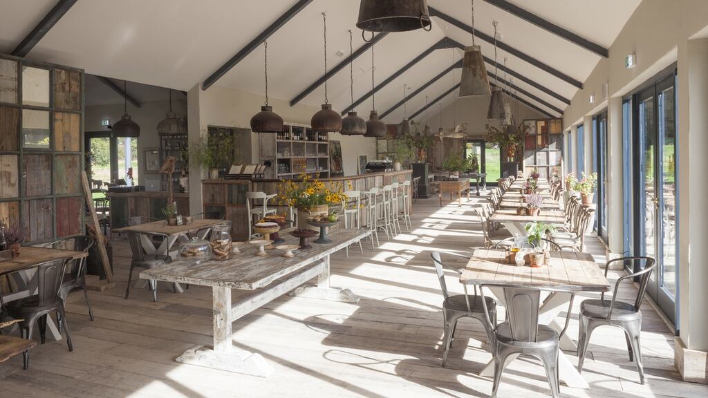 The Green Barn is a wooden building with a Scandi-shabby feel