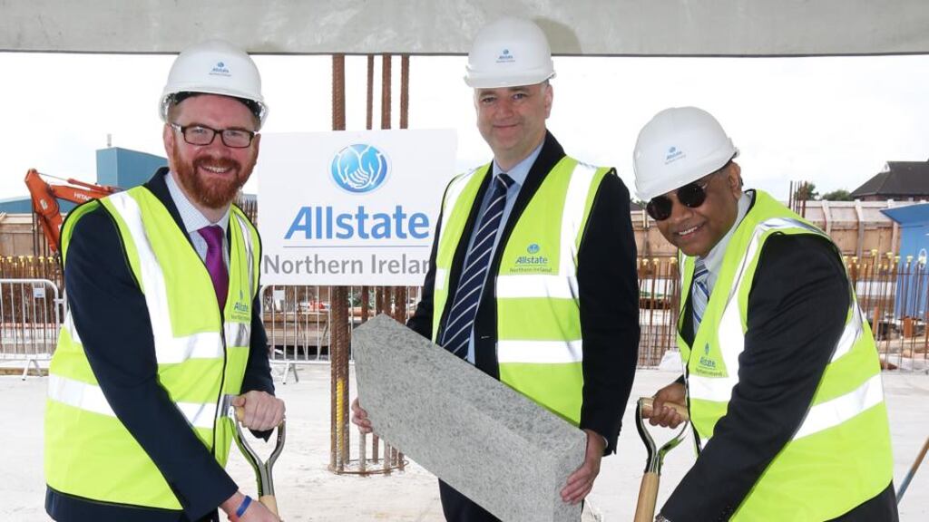 Northern Ireland’s Minister for the Economy, Simon Hamilton, with Allstate NI managing director John Healy   and Allstate executive vice-president  Suren Gupta at the laying of the foundation stone for the company’s new Belfast headquarters. Photograph: PressEye/Andrew Paton