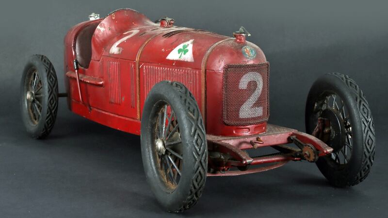A red, 1930s model Alfa Romeo P2 racing car achieved 4,600 through Mullen’s