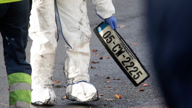 The number plate of the vehicle in which the man’s body was found. Photograph: Collins