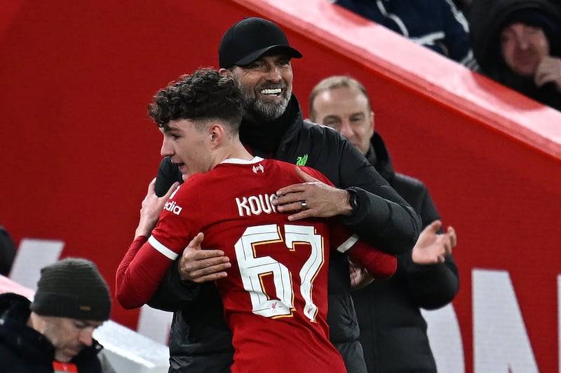 Liverpool's Lewis Koumas is congratulated by manager Jürgen Klopp at Anfield stadium on Wednesday. Photograph: Paul Ellis/AFP via Getty Images