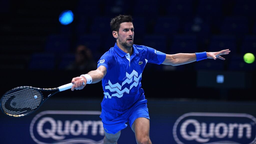 Serbia’s Novak Djokovic returns against Argentina’s Diego Schwartzman in their men’s singles round-robin match on day two of the ATP World Tour Finals at the O2 Arena in London. Photograph: Glyn Kirk/AFP