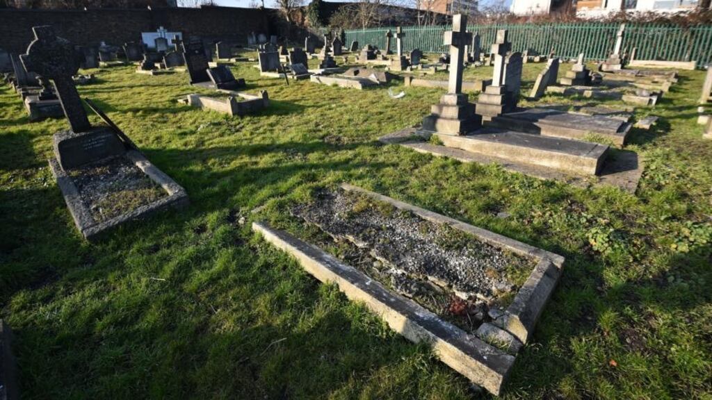 An 85-year-old woman had her handbag stolen while tending to her late husband’s grave on Saturday. File photograph: Ben Stansall/AFP/Getty Images