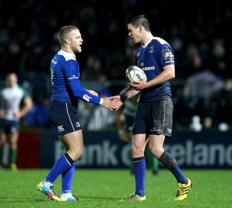 Ian Madigan in action for Leinster in 2016 with Johnny Sexton. Photograph: Ryan Byrne/Inpho